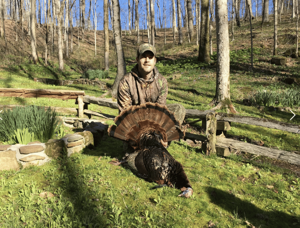 Image of hunter and turkey